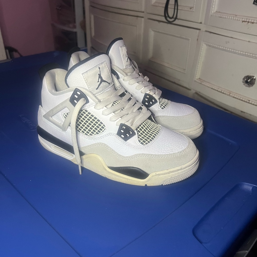 Air Jordan 4 White and Black Sneakers